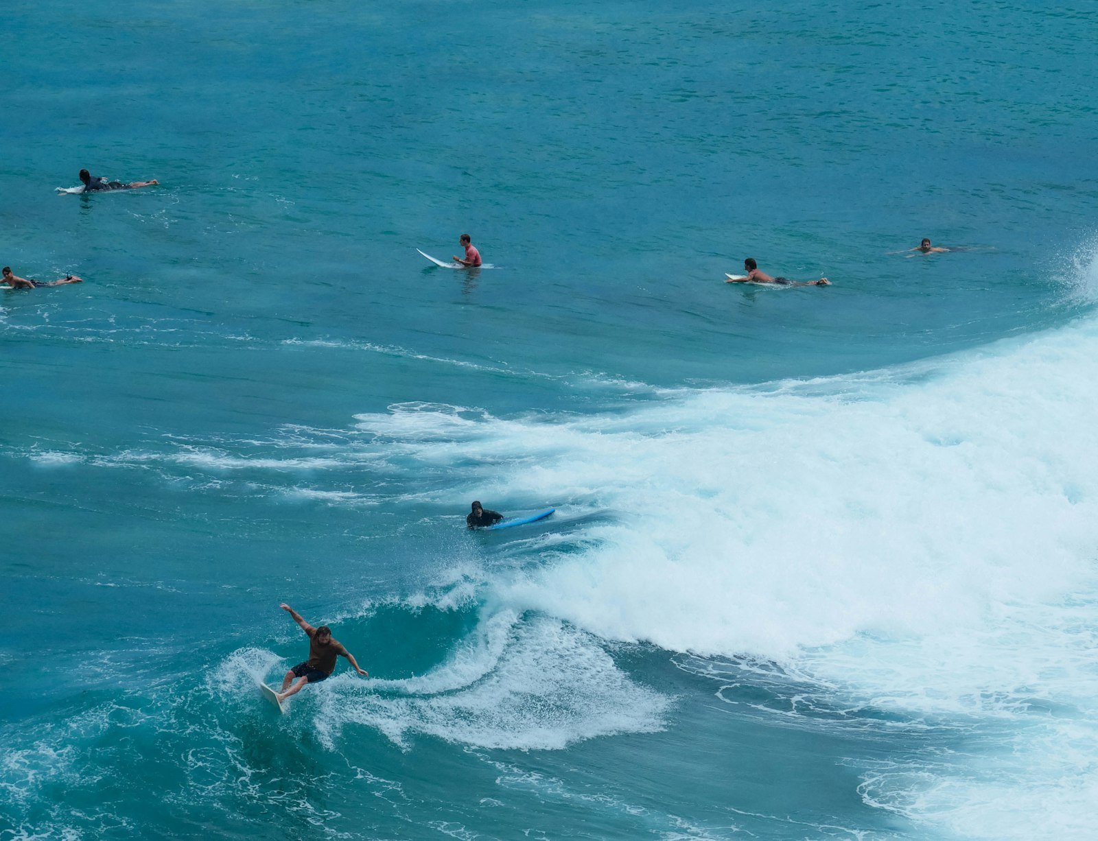 Surfers at a Bali beach break