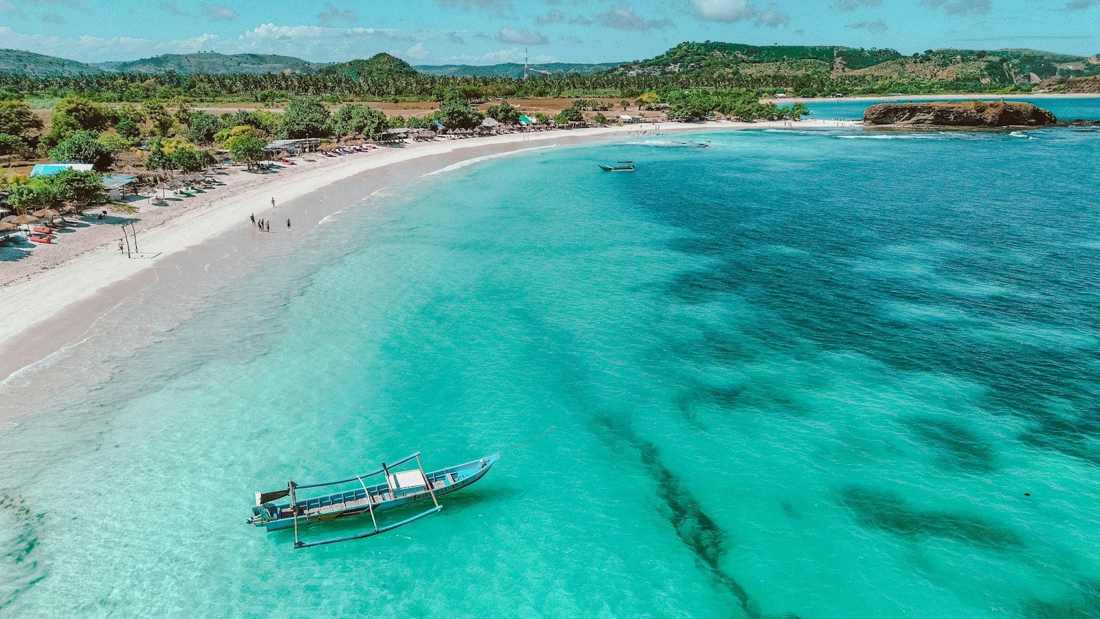Turquoise bay with a boat, south Lombok